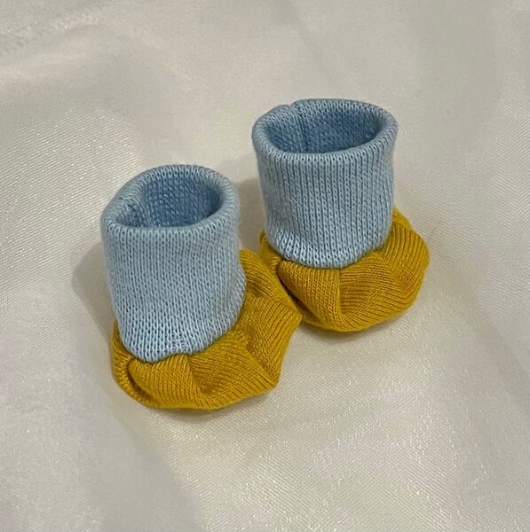 20-25 cm nukule helesinised-beežid papud